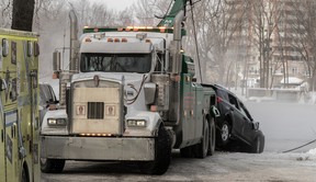 Police pulled a stolen SUV from Riviere des Prairies in Montreal Jan. 2, 2018.