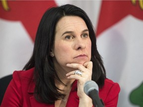 Montreal Mayor Valérie Plante listens to a reporter's question after delivering her administration's first budget in Montreal on Wednesday, Jan. 10, 2018.
