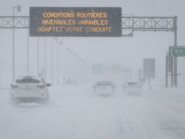 Transport Quebec advisory on eastbound Highway 20 during heavy snowfall in Montreal on Saturday, January 13, 2018.