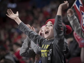 Eight year-old Felix Tanguay and his sister Oceanne Daigle cheer on the Montreal Canadiens, during open practice at the Bell Centre on Sunday January 14, 2018.