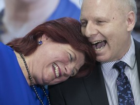 Pointe-aux-Trembles MNA Nicole Leger, left, and PQ leader Jean-Francois Lisee share a laugh after she announced she will not seek re-election in the fall of 2018. She made her announcement at her riding office in Pointe-aux-Trembles on Tuesday January 16, 2018. (Pierre Obendrauf / MONTREAL GAZETTE)