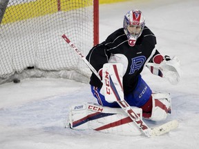 Laval Rocket goaltender Zachary Fucale watches a rebound during a team practice on Wednesday January 17.