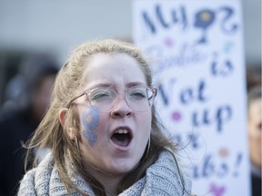 Catherine Lariviere takes part in a women's march in downtown Montreal on Jan. 20, 2018.