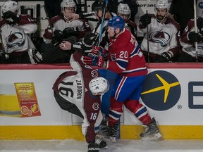 The Colorado Avalanche bench reacts to Montreal Canadiens left wing Nicolas Deslauriers (20) colliding with Colorado Avalanche defenceman Nikita Zadorov (16) during 1st period NHL action at the Bell Centre in Montreal, on Tuesday, Jan. 23, 2018.