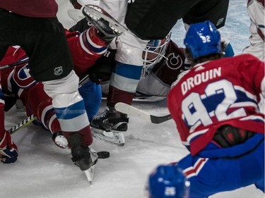 Montreal Canadiens centre Jonathan Drouin (92) can see but not reach the loose puck in front of teammates and Colorado Avalanche goaltender Jonathan Bernier (45) during 1st period NHL action at the Bell Centre in Montreal, on Tuesday, Jan. 23, 2018.