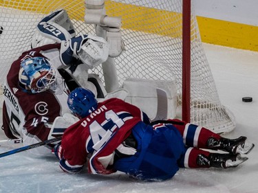 Montreal Canadiens left wing Paul Byron (41) collides with Colorado Avalanche goaltender Jonathan Bernier (45) during 2nd period NHL action at the Bell Centre in Montreal, on Tuesday, Jan. 23, 2018.