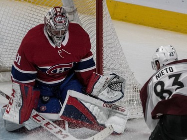 Montreal Canadiens goaltender Carey Price (31) smothers the shot from Colorado Avalanche left wing Matt Nieto (83) during 3rd period NHL action at the Bell Centre in Montreal, on Tuesday, Jan. 23, 2018.