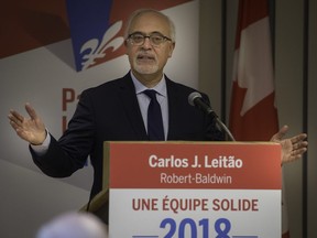 Carlos Leitao, Quebec Finance Minister and MNA for Robert Baldwin, announces his candidacy for the next provincial election in Dollard-des-Ormeaux on Monday night.