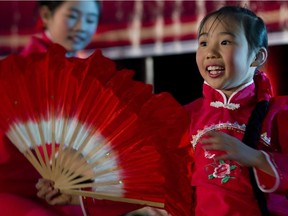 A children's dance group performs during a Chinese spring festival gala held at the Dollard-des-Ormeaux Civic Centre in 2015.