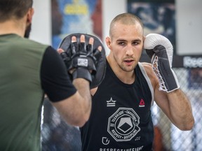 Rory MacDonald, with trainer Firas Zahabi at Tristar Gym in Montreal on June 1, 2016, The former UFC contender won a unanimous five-round decision to dethrone American-based Brazilian Douglas Lima in a war of attrition at Bellator 192 on Saturday night in Inglewood, Calif.