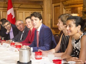 Prime Minister Justin Trudeau is seen in September 2017 at a round-table meeting with Facebook and McGill prior to a press conference announcing Facebook was opening an artificial intelligence lab in conjunction with McGill.