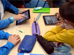 Student use tablets in this file photo.