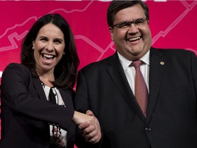 Denis Coderre and Valerie Plante prepare to take part a pre-election debate on Oct. 19, 2017.
