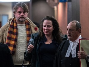 Arthur Trzciakowski, Anita Obodzinski and their lawyer Joseph La Leggia enter the courtroom on Nov. 10, 2016.