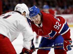 Canadiens centre Jonathan Drouin, right, has scored only five goals and is winning only 39.9 per cent of his faceoffs this season.