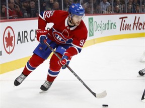 Canadiens centre Jonathan Drouin looks to move the puck out of the corner during game against the Columbus Blue Jackets during NHL game at the Bell Centre in Montreal on Nov. 14, 2017.