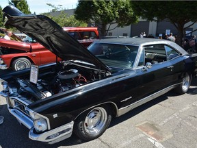 A 1965 Pontiac Parisienne on display.