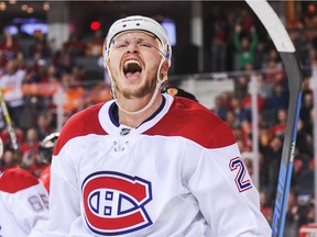 The Canadiens’ Nicolas Deslauriers celebrates after scoring against the Flames during game at Calgary’s Scotiabank Saddledome on Dec. 22, 2017.