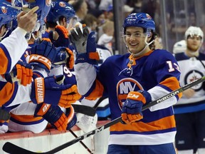 Mathew Barzal of the New York Islanders celebrates his hat trick goal at 11:22 of the third period against the Winnipeg Jets at the Barclays Center on Dec. 23, 2017, in Brooklyn.