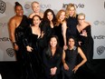 Activist Rosa Clemente, actors Natalie Portman, Michelle Williams, America Ferrera, Jessica Chastain, Amy Poehler, Meryl Streep, and (bottom) activists Ai-jen Poo and Saru Jayaraman attend the 2018 InStyle and Warner Bros. 75th Annual Golden Globe Awards Post-Party at The Beverly Hilton Hotel on Sunday.