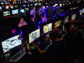 LEIPZIG, GERMANY - JANUARY 27: Participants sit at computer monitors to play video games at the 2018 DreamHack video gaming festival on January 27, 2018 in Leipzig, Germany. The three-day event brings together gaming enthusiasts mainly from German-speaking countries for events including eSports tournaments, cosplay contests and a LAN party with 1,500 participants. (Photo by Jens Schlueter/Getty Images) ORG XMIT: 775105546