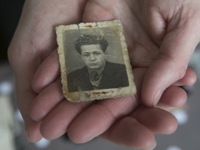 Regina Zorman holds a picture of her father, Max Zorman, at her home in Dorval. He died in 2003.