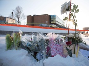 Events continue all weekend in Quebec City to honour the victims of the Jan. 29, 2017 mosque shooting. Here, flowers at a makeshift memorial near the Islamic Cultural Center the day after the shooting.