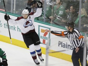 Colorado Avalanche forward Nathan MacKinnon celebrates his goal during the third period of NHL game against the Stars on Jan. 13, 2018, in Dallas.