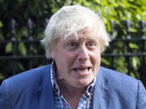 Boris Johnson speaks to the media outside his ministerial residence in central London, Sunday June 11, 2017.