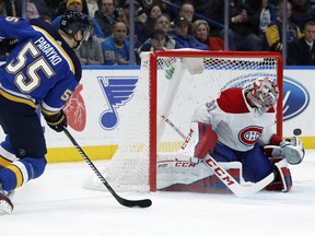 Blues' Colton Parayko shoots wide of Canadiens goaltender Carey Price during the second period Tuesday night in St. Louis.