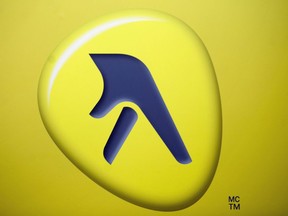 Yellow Media Inc. logo is shown at the company's quarterly results meeting in Montreal, Thursday, May 6, 2010. Yellow Pages Ltd. is cutting roughly 500 jobs in an effort to reduce spending and improve its results.