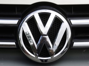 The brand logo of German car maker Volkswagen on a car in Berlin on Aug. 1, 2017.Volkswagen has reached a $290.5-million deal to settle claims in Canada covering 20,000 3.0-litre Volkswagen, Audi and Porsche diesel vehicles that were caught up in an emissions cheating scandal.THE CANADIAN PRESS/AP, Markus Schreiber