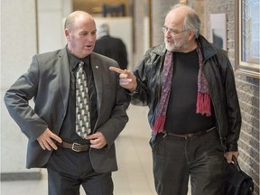 Train engineer Thomas Harding, left, leaves the courtroom with his lawyer Tom Walsh in Sherbrooke in January 2018. He was acquitted.