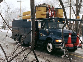 A Hydro-Québec repair truck drives through Pointe-Claire on Jan. 6, 1998.