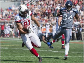 Ottawa Redblacks' fullback Patrick Lavoie runs in for a touchdown during first half against the Montreal Alouettes in Montreal on Sept. 17, 2017.