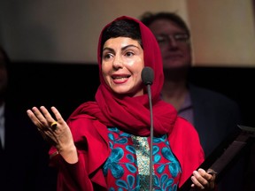 Director Sadaf Foroughi accept the Prize of the International Film Critics for her movie Ava, at the Toronto International Film Awards in Toronto, Sunday, Sept.17, 2017.