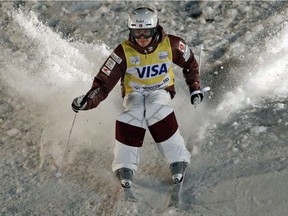 Canada's Mikael Kingsbury competes in the men's World Cup freestyle moguls at Deer Valley, Thursday, Jan. 11, 2018, in Park City, Utah.