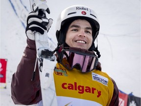 Quebec's Mikael Kingsbury celebrates his victory in the men's World Cup freestyle moguls event in Calgary, Alta., Saturday, Jan. 6, 2018.