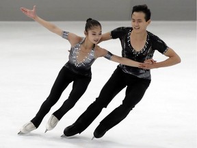 Ryom Tae-Ok and Kim Ju-Sik of North Korea compete during the pairs short program at the Figure Skating-ISU Challenger Series in Oberstdorf, Germany, on Sept. 28, 2017.