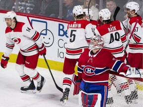 Montreal Canadiens goaltender Carey Price looks up after being scored on by Carolina Hurricanes right-wing Justin Williams (14) during third period NHL hockey action in Montreal, Thursday, January 25, 2018.