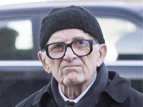 Former sportswriter Red Fisher arrives for the funeral of Montreal Canadiens' hockey legend Dickie Moore at the Mountainside United Church, in Montreal, on Monday, Dec. 28, 2015. Legendary hockey writer Fisher has died. The Montreal Gazette, where he worked the last 33 years of his career, reported on Friday that Fisher had died at age 91.