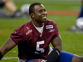 Khalil Carter, who played with the Alouettes in 2008,  laughs with team-mates while stretching at the beginning of practice at the Olympic Stadium November 11, 2008.