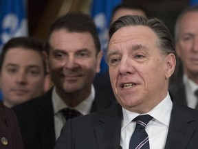 Coalition Avenir Quebec Leader Francois Legault responds to reporters questions during the end of session new conference at the National Assembly in Quebec City Friday, December 8, 2017