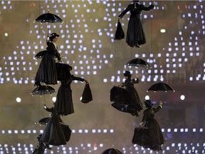 Actors dressed as Mary Poppins perform during the Opening Ceremony at the 2012 Summer Olympics, Friday, July 27, 2012, in London.