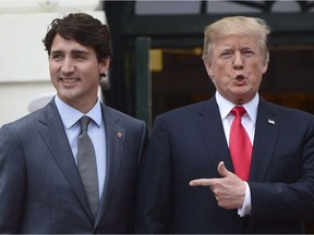 Prime Minister Justin Trudeau is greeted by U.S. President Donald Trump at the White House in October.