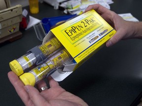 Despite the fact most known allergy sufferers carry EpiPens, there seems to be a reluctance to use them, Allison Hanes writes.