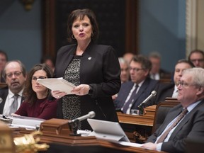 Quebec Minister for Rehabilitation, Youth Protection and Public Health Lucie Charlebois tables a legislation on cannabis during question period in Quebec City on Thursday, November 16, 2017.