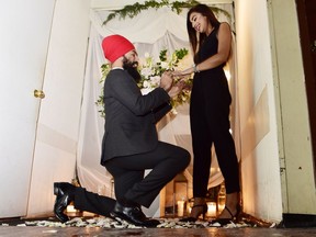 NDP Leader Jagmeet Singh proposes to Gurkiran Kaur at an engagement party in Toronto, Jan. 16, 2018.