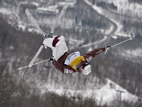 Canada's Mikaël Kingsbury of Deux-Montagnes jumps in the moguls run at the freestyle ski world cup 2018 on Saturday, Jan., 2018, in Mont-Tremblant.