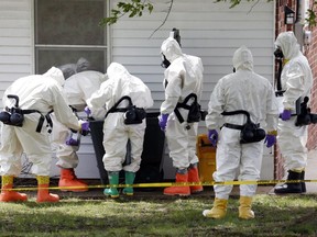 U.S. federal agents wearing hazardous material suits inspect a trash can in Corinth, Miss. in 2013 after a man was suspected of sending letters covered in ricin to U.S. President Barack Obama and a senator. Ricin, the lectin found in castor beans, is one of the most powerful poisons in existence. Most other lectins are no cause for alarm, Joe Schwarcz writes.